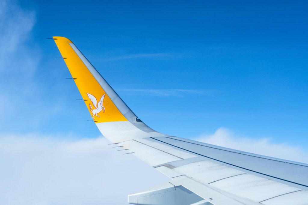 Airplane Wing with Clear Blue Sky